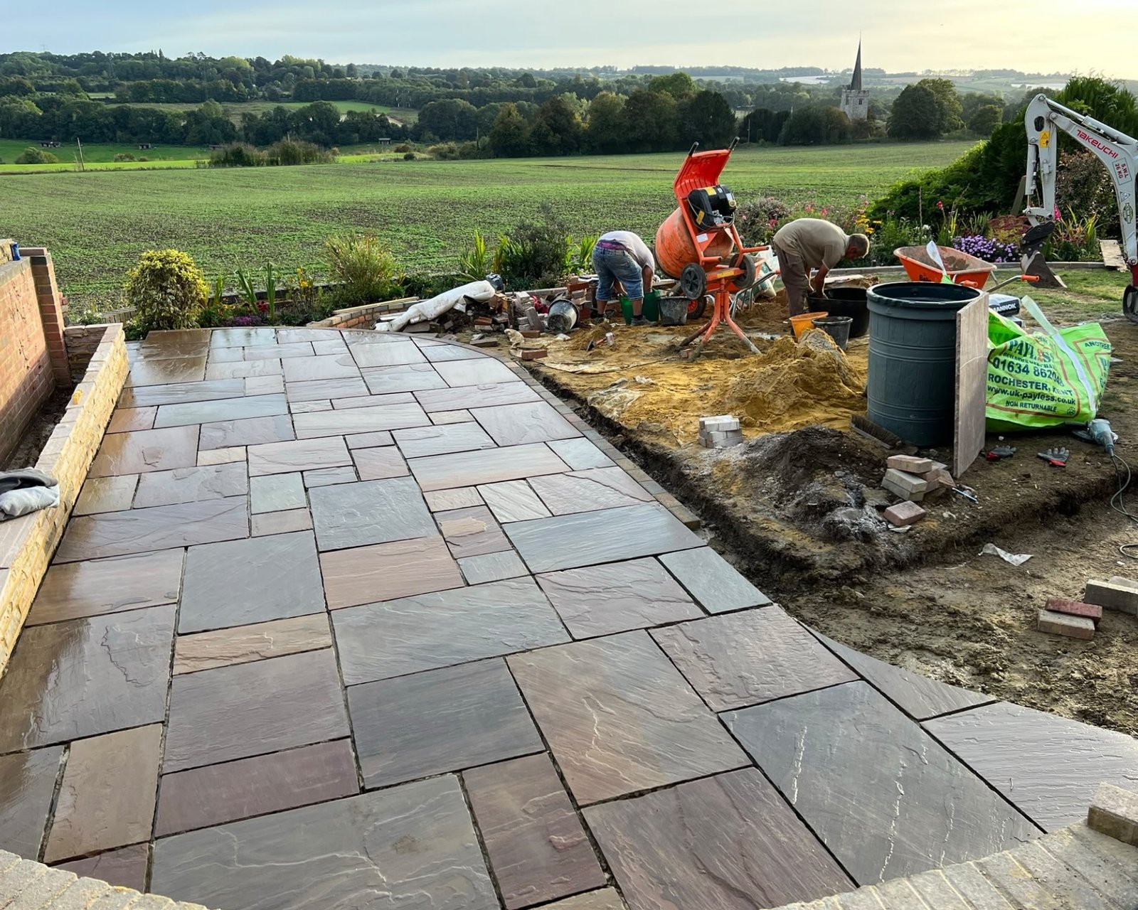natural-stone-patio-installation-being-undertaken-terrabase-paving natural-stone-patio-installation-being-undertaken-terrabase-paving