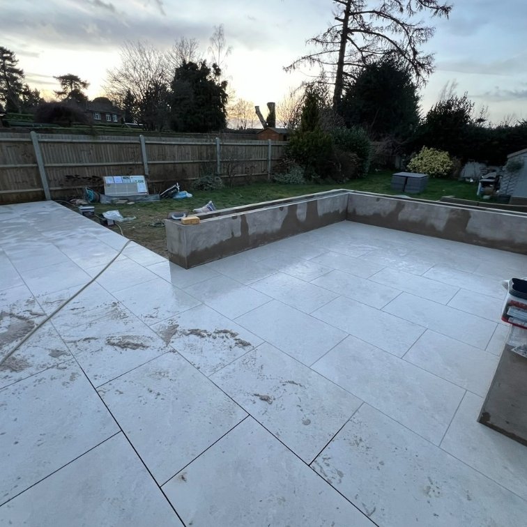 porcelain-patio-and-wall-being-erected